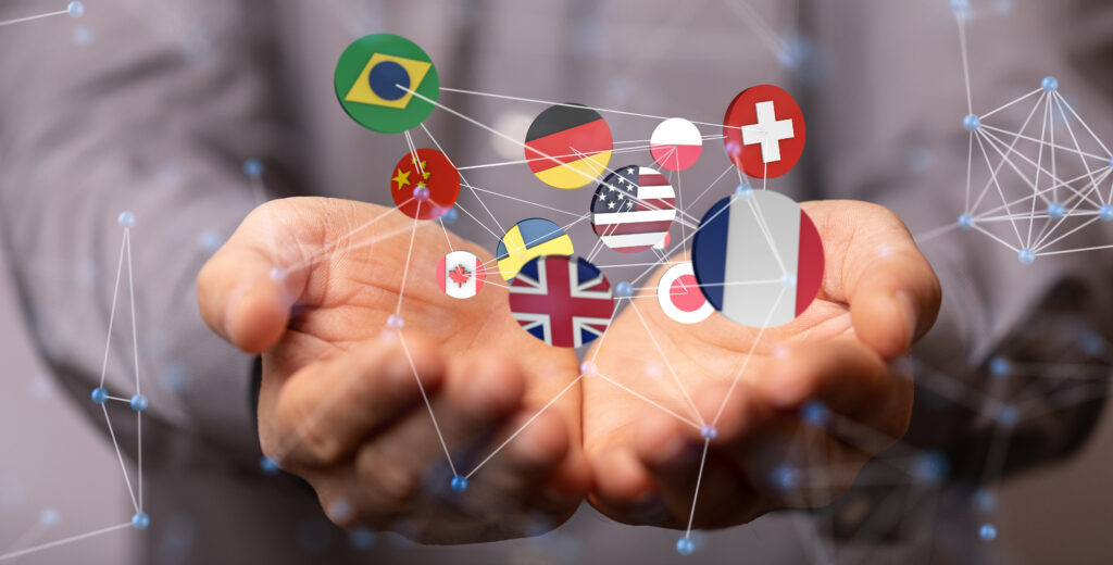 Mains ouvertes avec drapeaux de plusieurs pays apparaissant